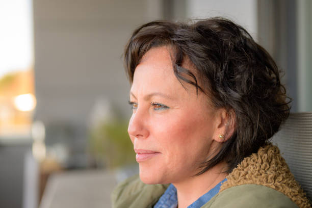 istock Attractive thoughtful serious brunette woman 1214917248