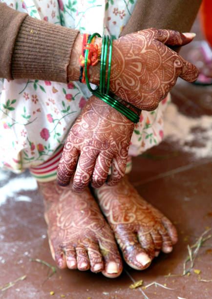 istock Indian girl Complete a Rasam in Wedding Ritual 1214917973