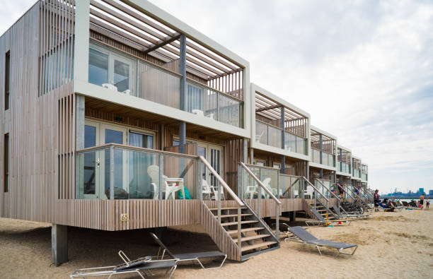 HOEK VAN HOLLAND, NETHERLANDS - MAY 21, 2018: Several wooden beach holiday apartments along the dutch north sea coast