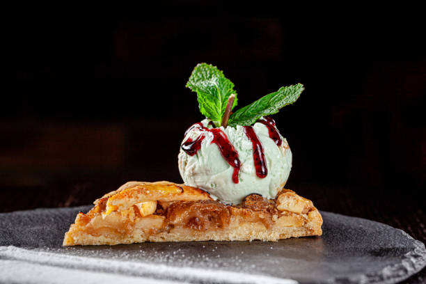 istock Apple pie, a grid of dough on top. Pie with peppermint ice cream. background image, copy space text 1214922867