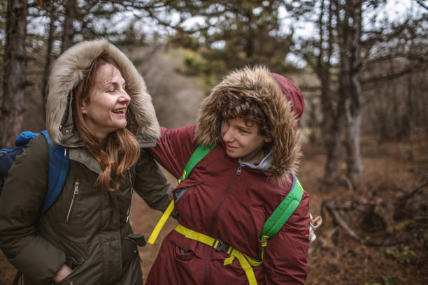 istock Mother and son hiking in forest 1214922996
