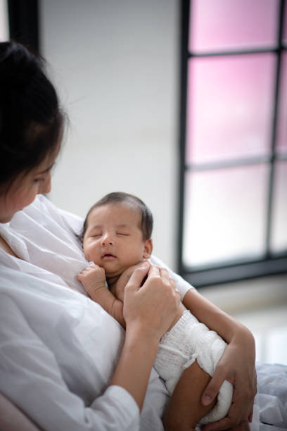 istock new born, Lovely newborn baby 1214923097