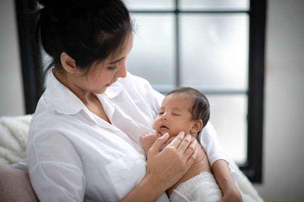 istock new born, Lovely newborn baby 1214923551