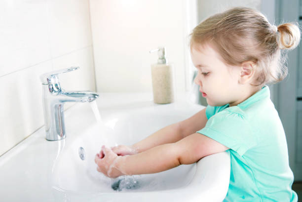 istock Child washing hands with soap,kid's hygiene concept. 1214927828
