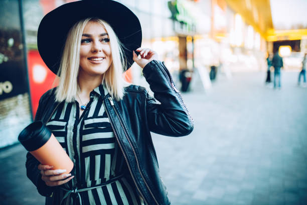istock Sensual elegant young lady in the city 1214928741