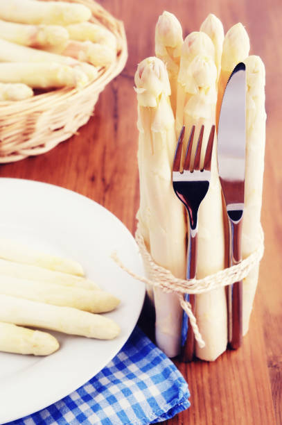 istock Bunch of fresh white asparagus on plate 1214929026