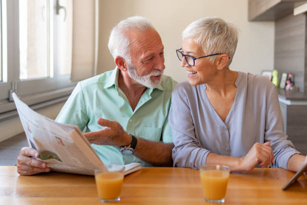 istock Elderly couple working from home 1214930205