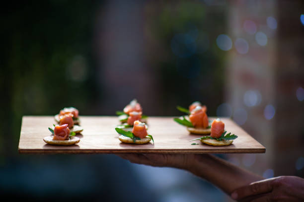 Salmon Appetisers sofas with defocussed fairy lights background