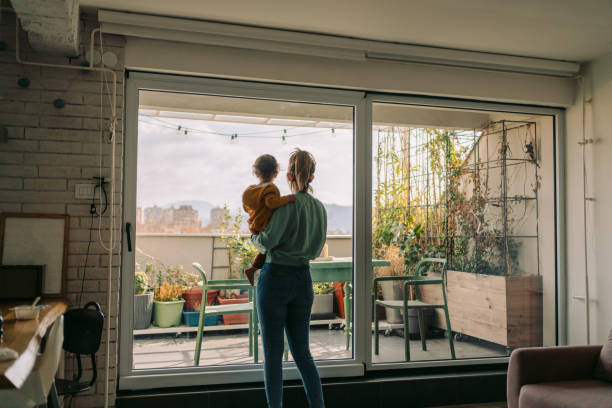 istock Little boy in mother's arms 1214931717