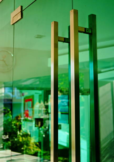 istock Door handle with Modern glass doors 1214931803