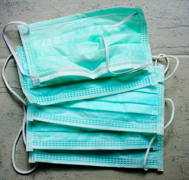 istock Face masks for protective covid-19 virus on floor 1214932054