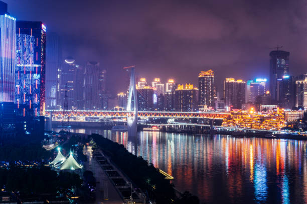 istock riverside skyline at night, Chongqing, China 1214933182