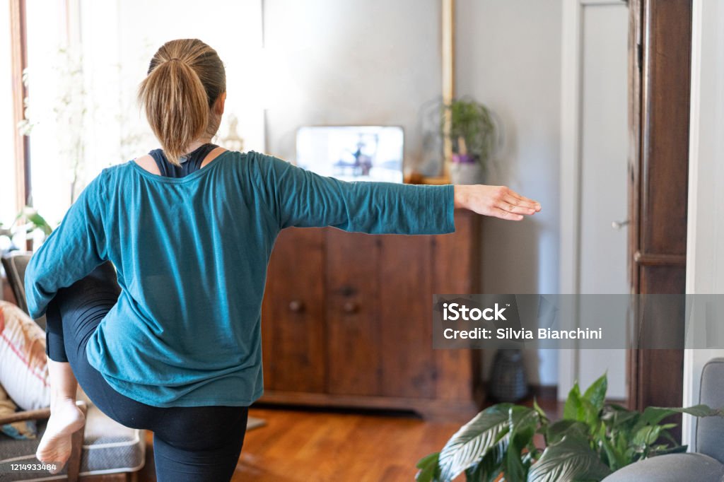 exercise breaks Yoga exercise breaks from home Home Workout Stock Photo