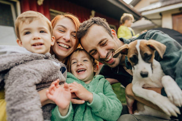 istock Happy family in a yard 1214933629