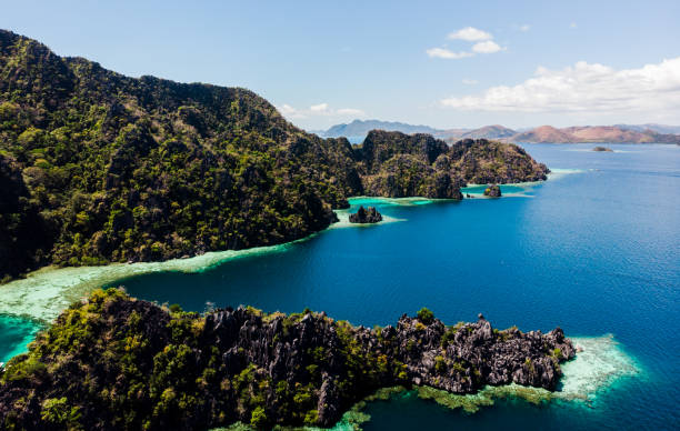istock Surfing in Duli beach, El Nido, Palawan 1214936443
