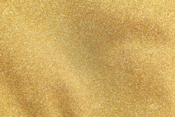 istock texture of golden background, christmas abstract background, golden backdrop 1214937659