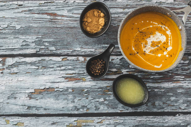 istock Pumpkin and carrot soup 1214937661