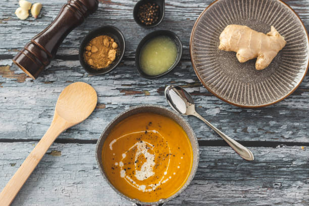 istock Pumpkin and carrot soup with ginger 1214937779