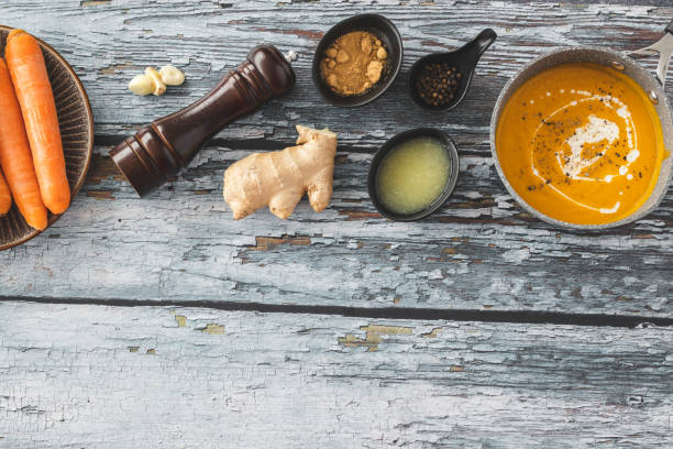 istock Pumpkin and carrot soup with ginger 1214938119