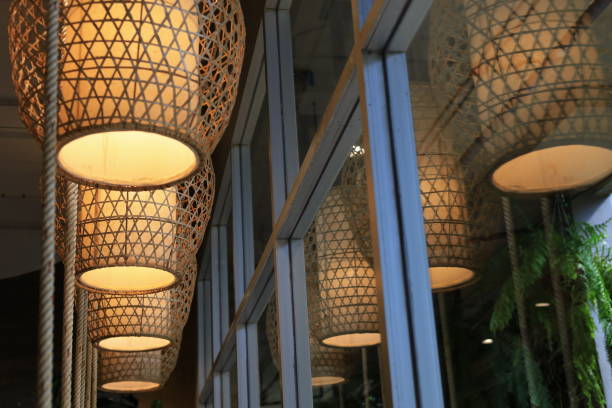 istock bamboo lamp and reflection in the mirror, Modern and contemporary bamboo lamp 1214938168
