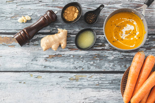 istock Pumpkin and carrot soup with ginger 1214942737