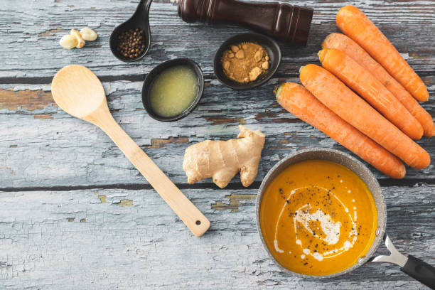 istock Pumpkin and carrot soup with ginger 1214942799