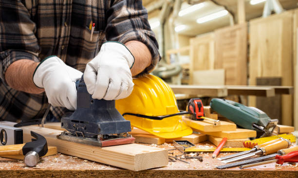 istock Carpenter at work on wooden boards. Carpentry. 1214944157