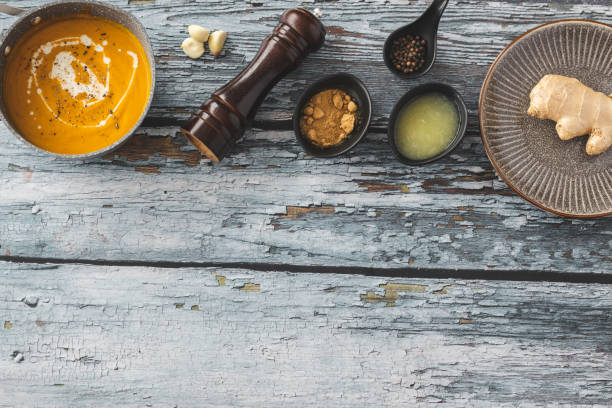 istock Pumpkin and carrot soup with ginger 1214944610