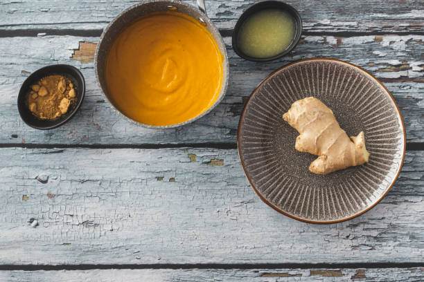 istock Pumpkin and carrot soup with ginger 1214944876