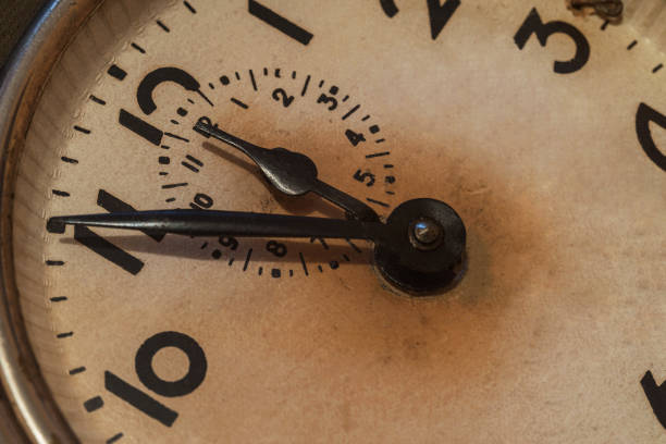 istock Old alarm clock close-up, time has stopped to .................. 1214945450