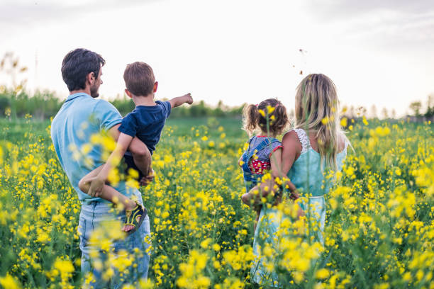 istock Young family enjoying nature 1214945629
