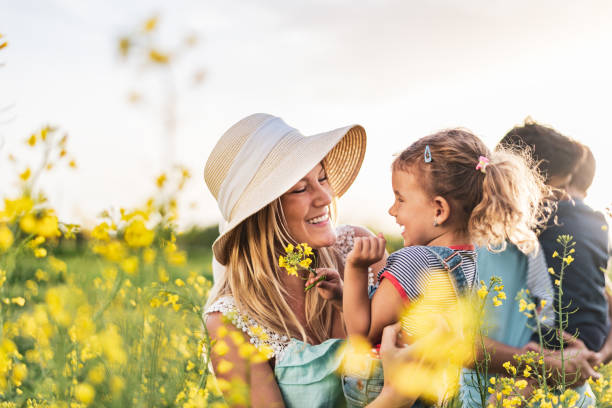 Young happy family enjoying nature