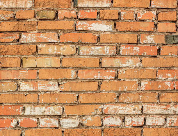 istock Orange brick wall of an old house 1214947096