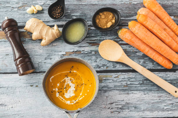 istock Pumpkin and carrot soup with ginger 1214947435