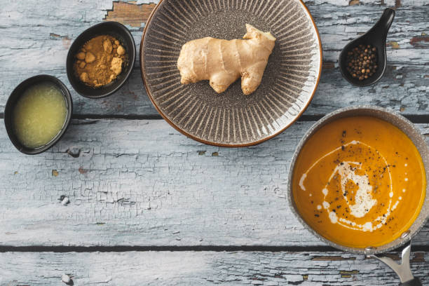 istock Pumpkin and carrot soup with ginger 1214947924