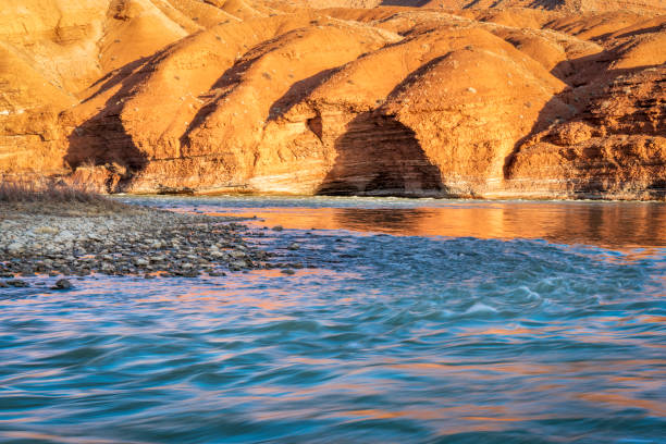 Colorado River at Rocky Rapid above Moab, Utah in winter scenery in morning light