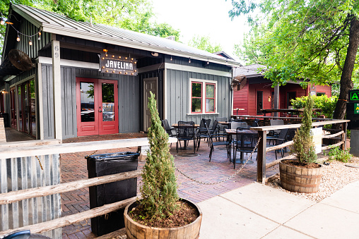 In Austin, United States this historic home on Rainey Street is now a restaurant with outdoor seating.
