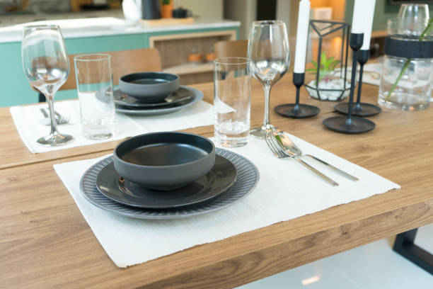 istock plate setting of dinning room at home. 1214955190