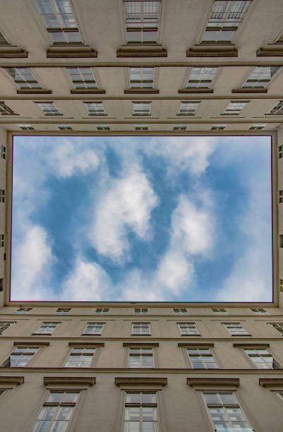 istock building frame square shape walls and windows landmark view from below cloudy sky background copy space for your text here vertical pattern picture 1214956587