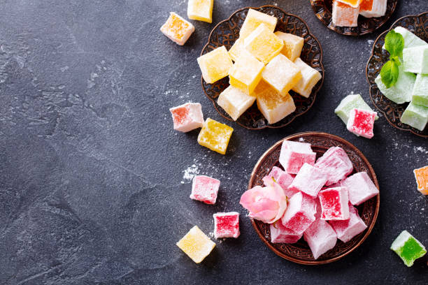 istock Assortment of Turkish delights. Dark background. Copy space. Top view. 1214958313