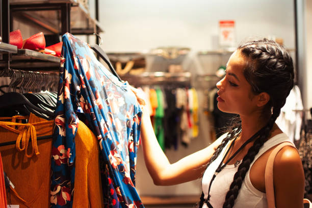 istock Woman in a shopping mall 1214959059