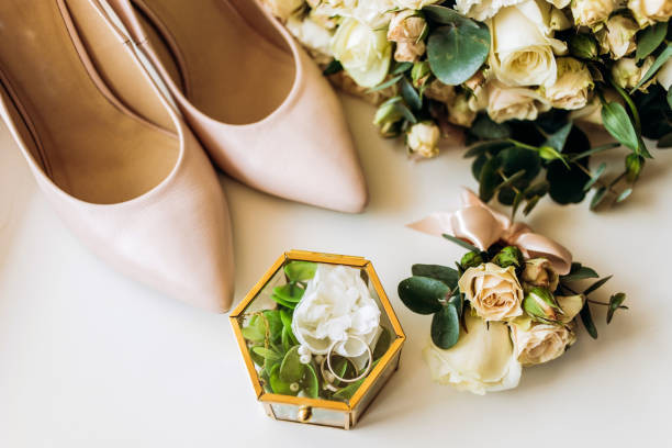 istock Composition of shoes and glass box 1214961425