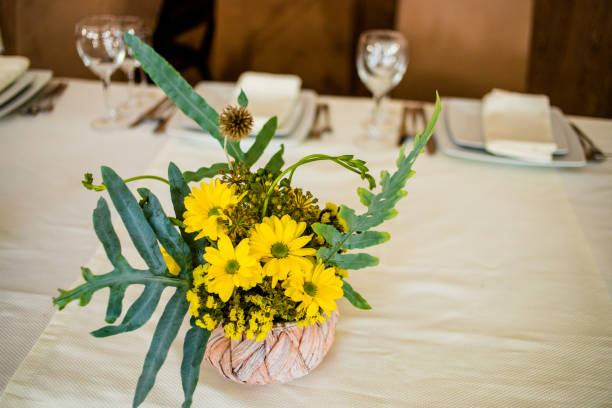 istock Decorative table design for newlyweds in yellow colors. 1214961550