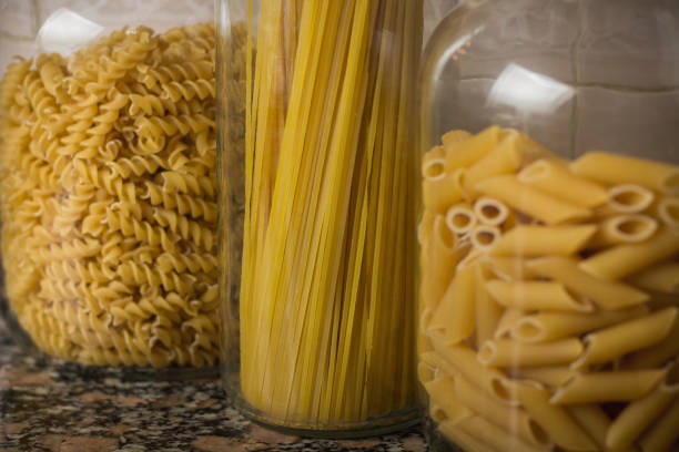 istock different types of noodles in glass jars - noodles 1214963033
