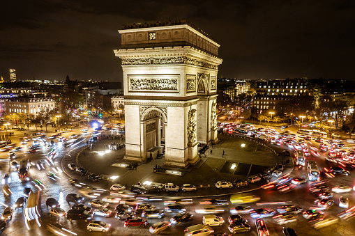 Paris, France 26.11.2019: Triumphal Arch of the Star at Night. It is one of the most famous monuments in Paris