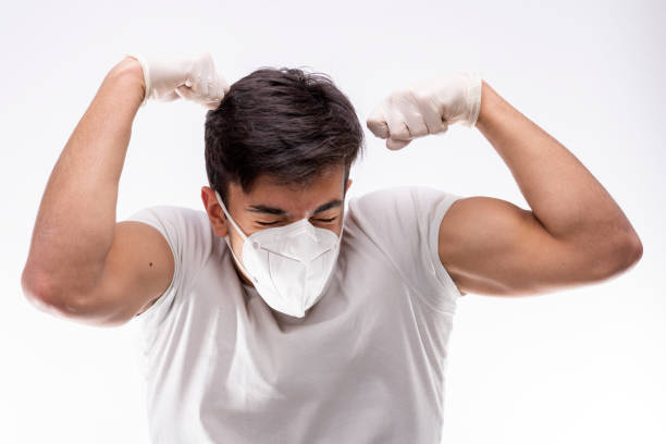 Male doctor wearing surgical mask. stock photo