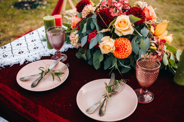 istock Wedding cutlery in rustic style is decorated with floral arrangements 1214965254