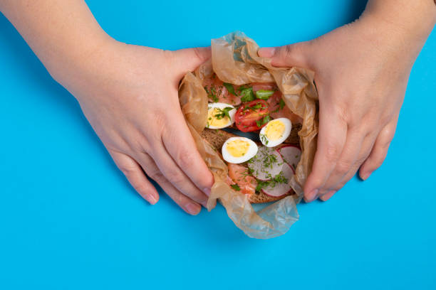 istock The cook is holding raw quail eggs on blue table 1214966130