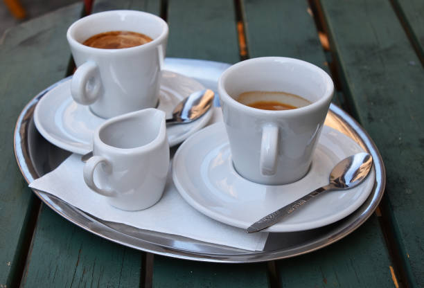 istock Tray with coffee cups and milk served on table 1214966354