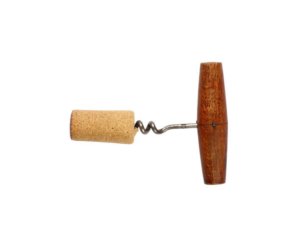 istock Vintage wine bottle opener and cork isolated 1214966782